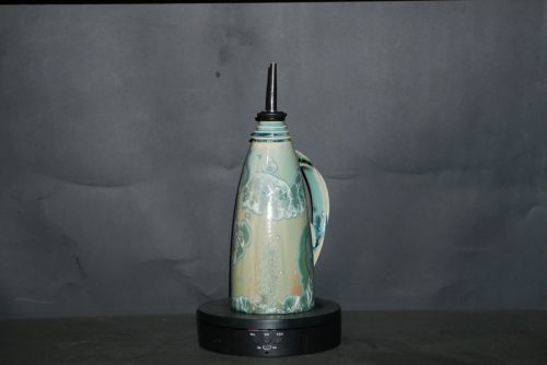 Huilier en porcelaine vert turquoise