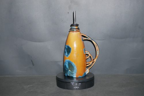 Huilier en porcelaine orange marron cristaux bleus