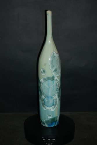 Petit soliflore-bouteille en porcelaine vert turquoise