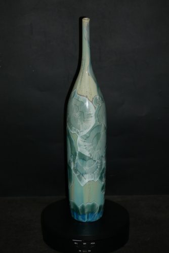 Petit soliflore-bouteille en porcelaine vert turquoise