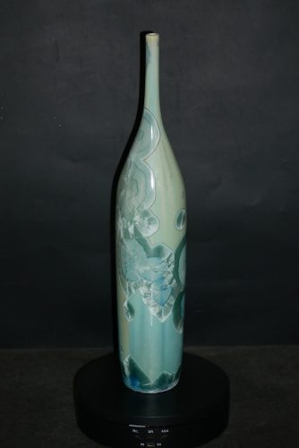 Petit soliflore-bouteille en porcelaine vert turquoise